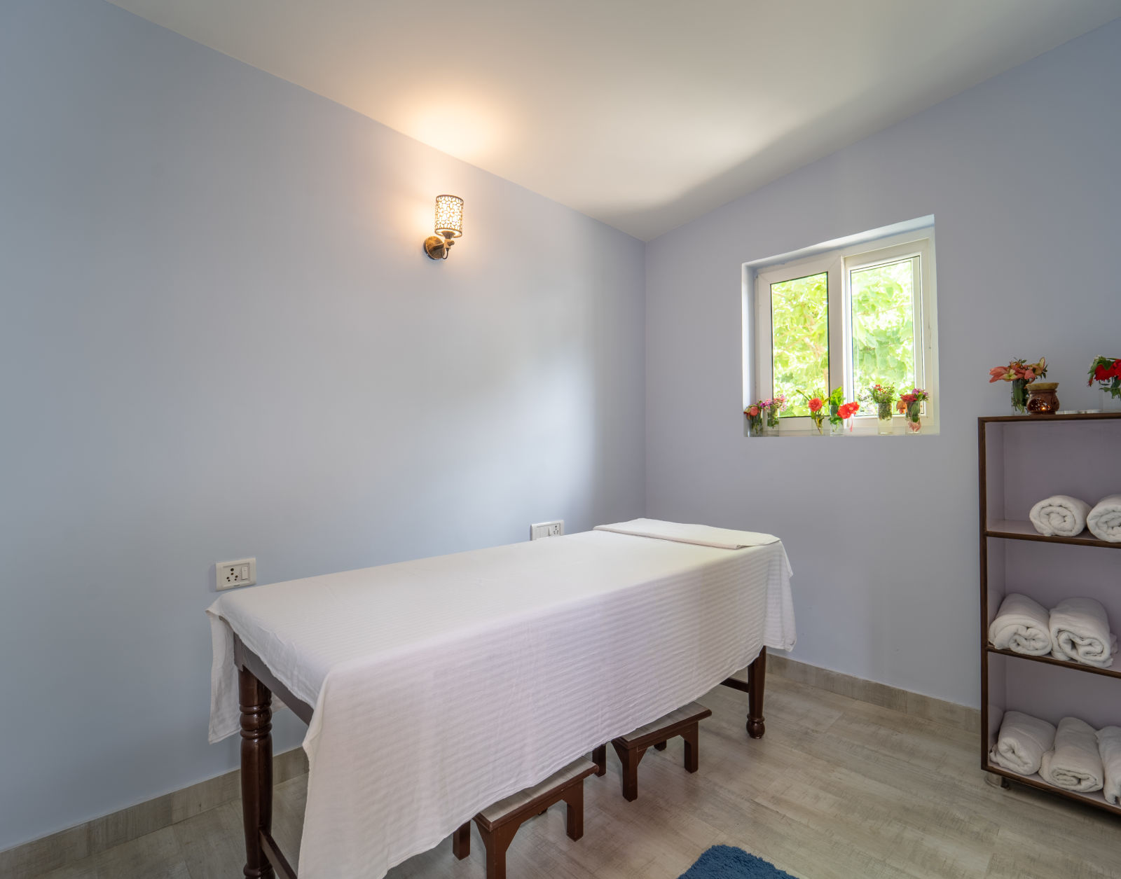 spa with a table covered with white cloth at Neer Ganga Resorts