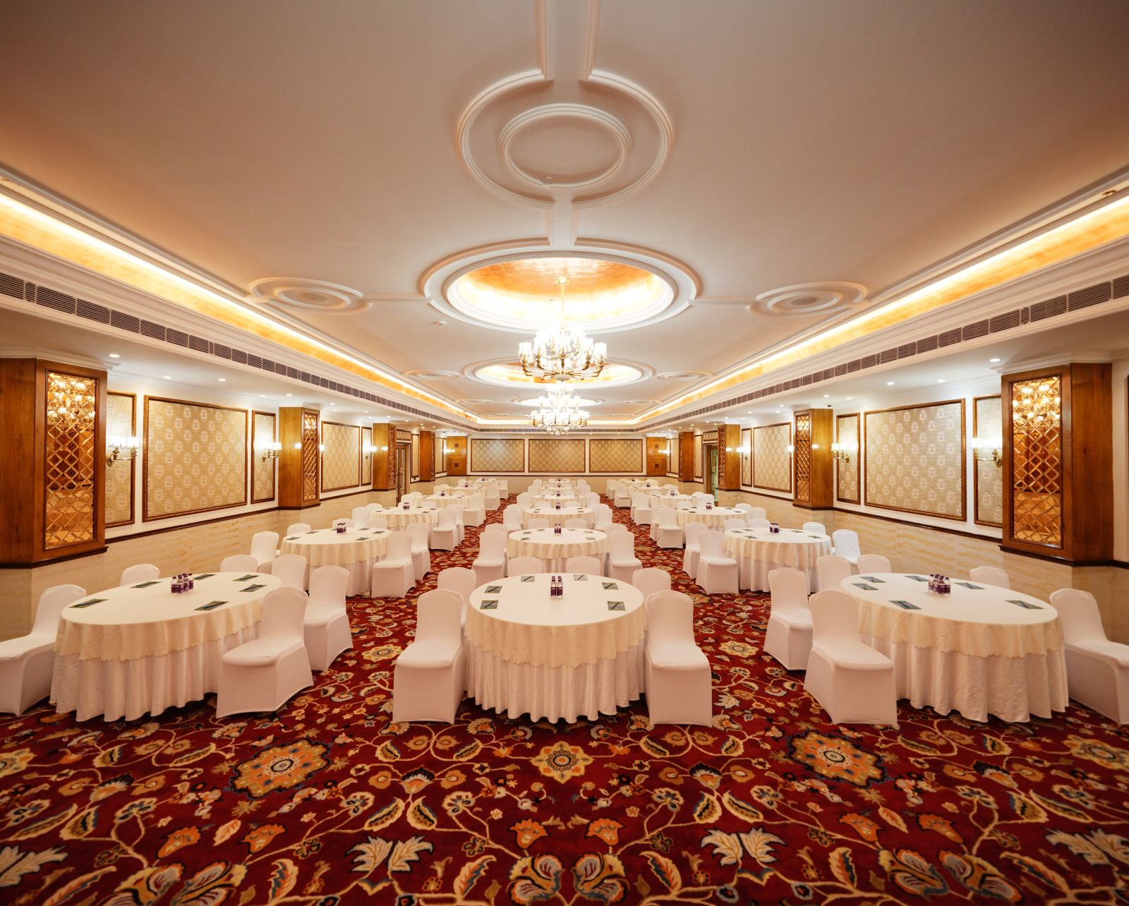 indoor seating space at a banquet hall - Mayfair Tea Resort, Siliguri 5