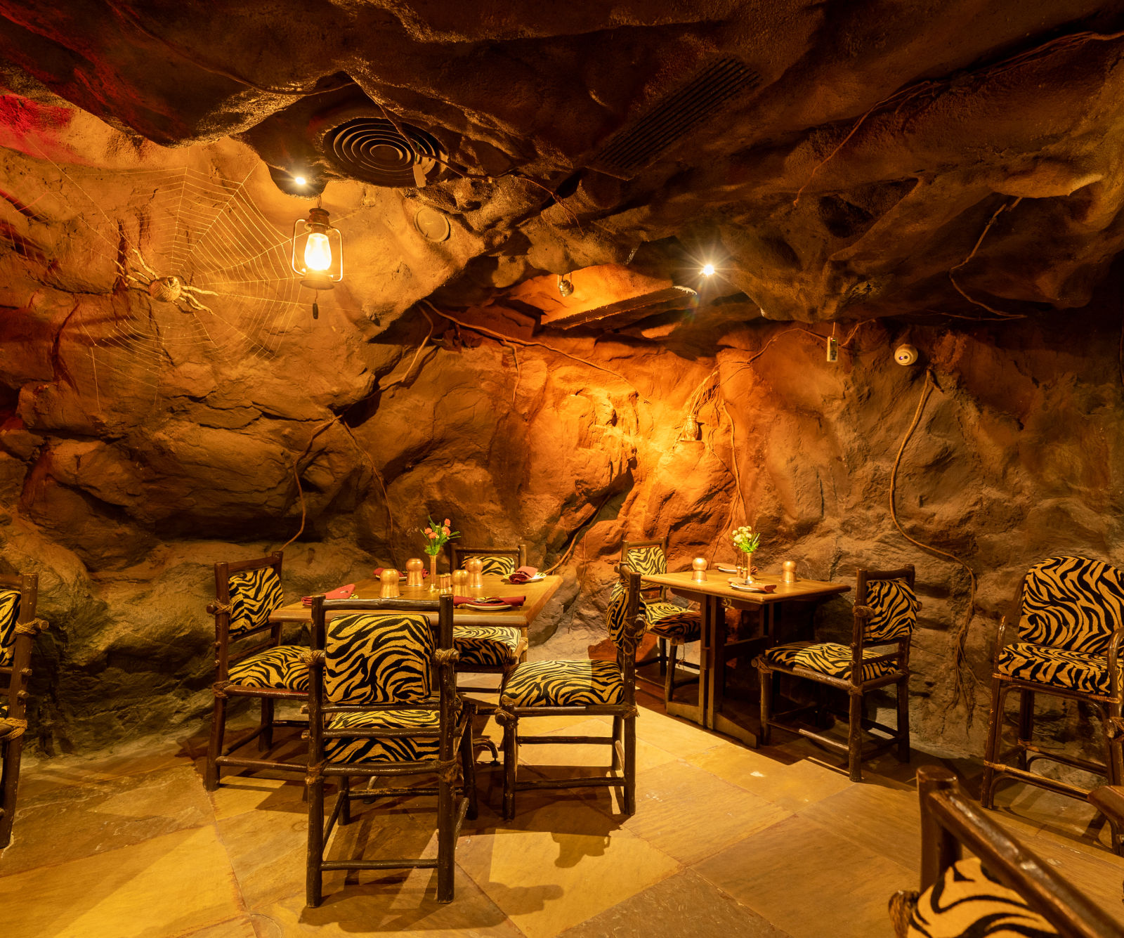 seating arrangements inside one of the restaurants - Hotel Pai Vista, Mysore