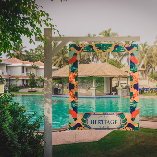 swimming pool at heritage village resort and spa goa