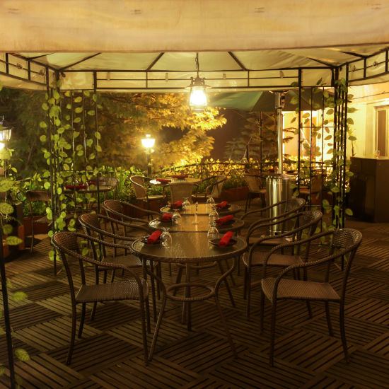 the cosy seating area during night time - Hotel Polo Towers, Shillong