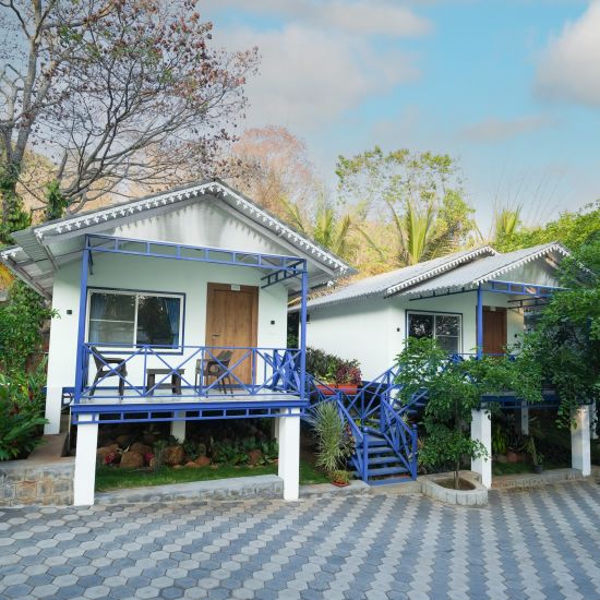 image of exterior of the property with two cottages side by side - MGM Whispering Wind's, Yelagiri