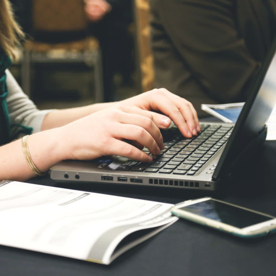 a woman working on her laptop