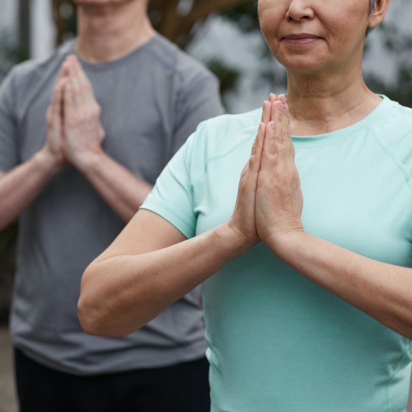 2 persons in Tadasana yoga pose