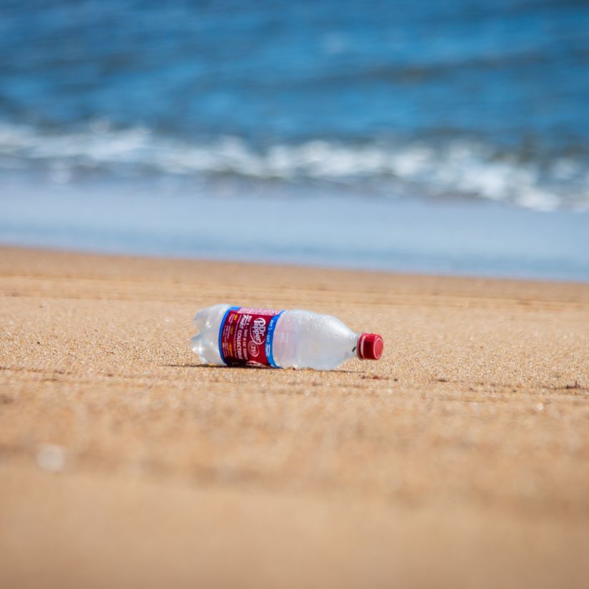 Symphony Samudra Port Blair - Bottle discarded on the beach