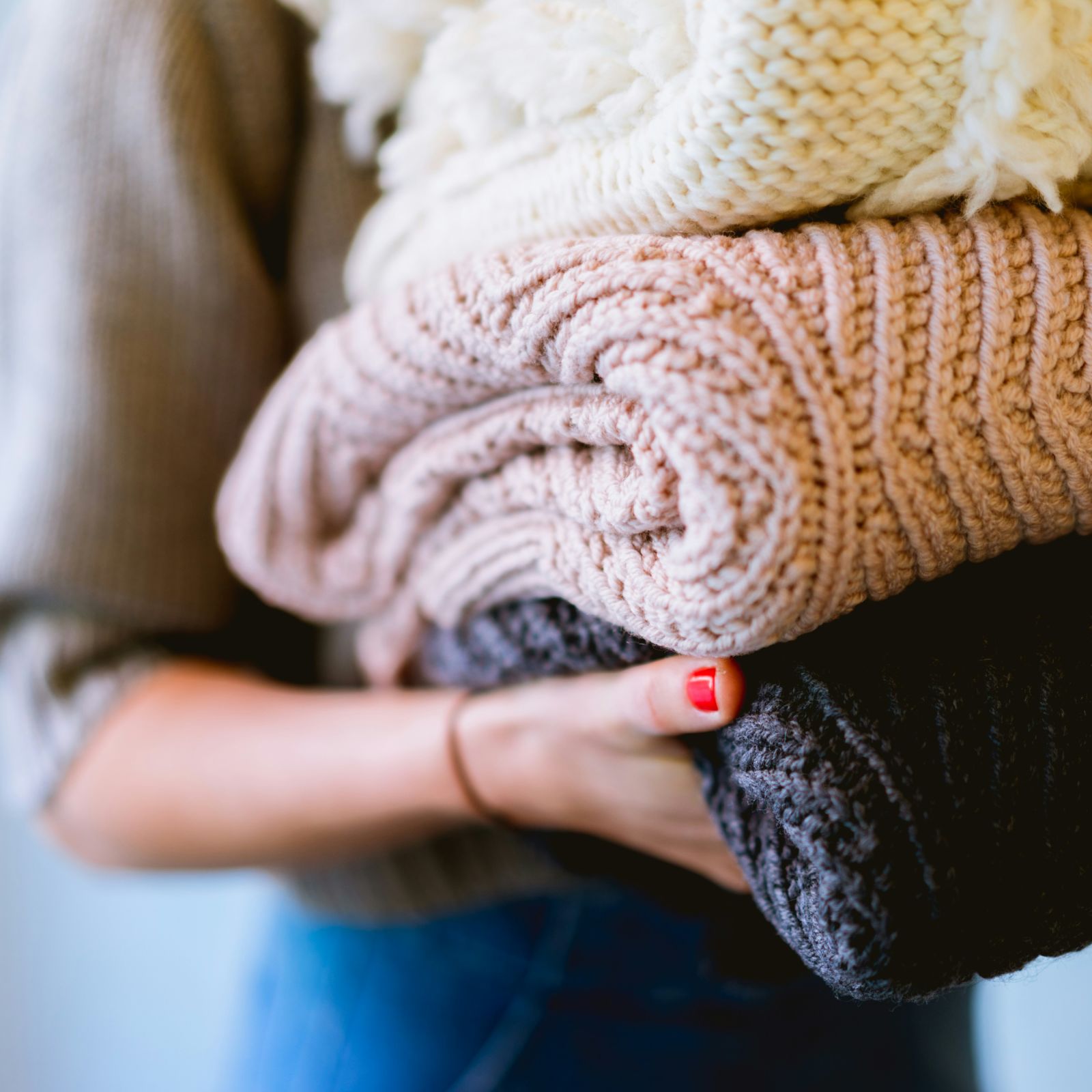 A women carry the woollen cloths after laundry