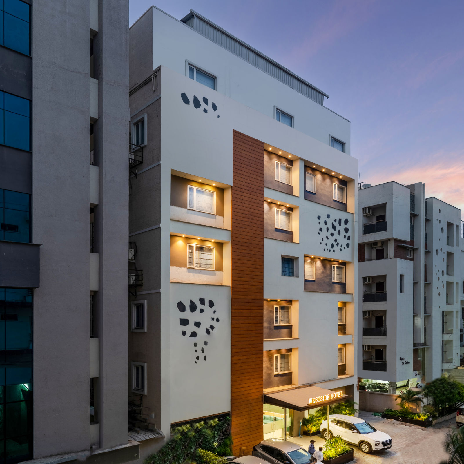 A left side angle facade shot of West side hotel.