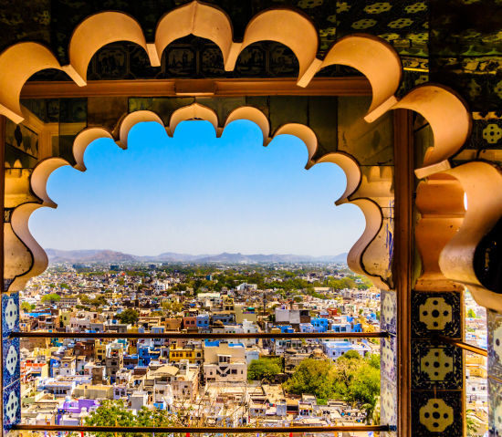 alt-text A beautiful shot of udaipur from the window of the city palace