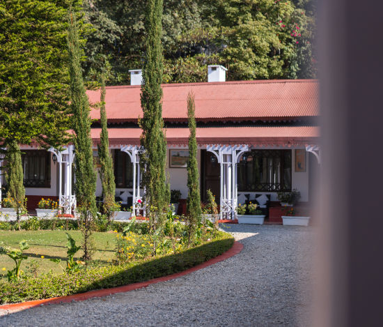 alt-text Facade view of The Claridges Nabha Residence, Mussoorie