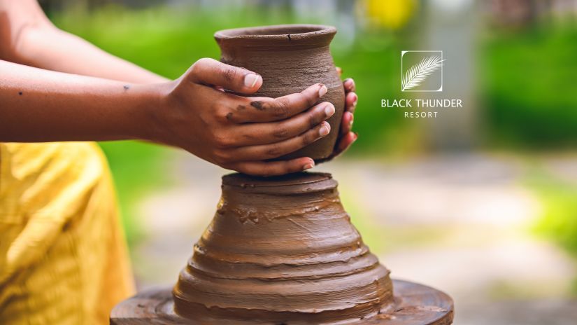 a person making a clay pot - Black Thunder, Coimbatore