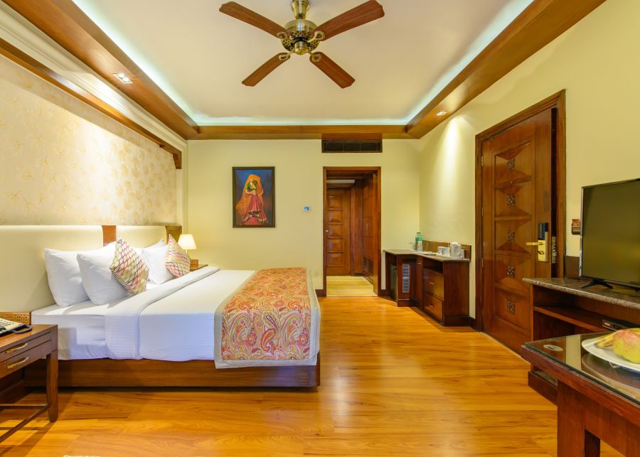 alt-text interior of a well-decorated and equipped room at Ananta Pushkar 2