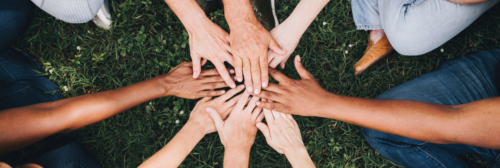 people holding out their hands in solidarity