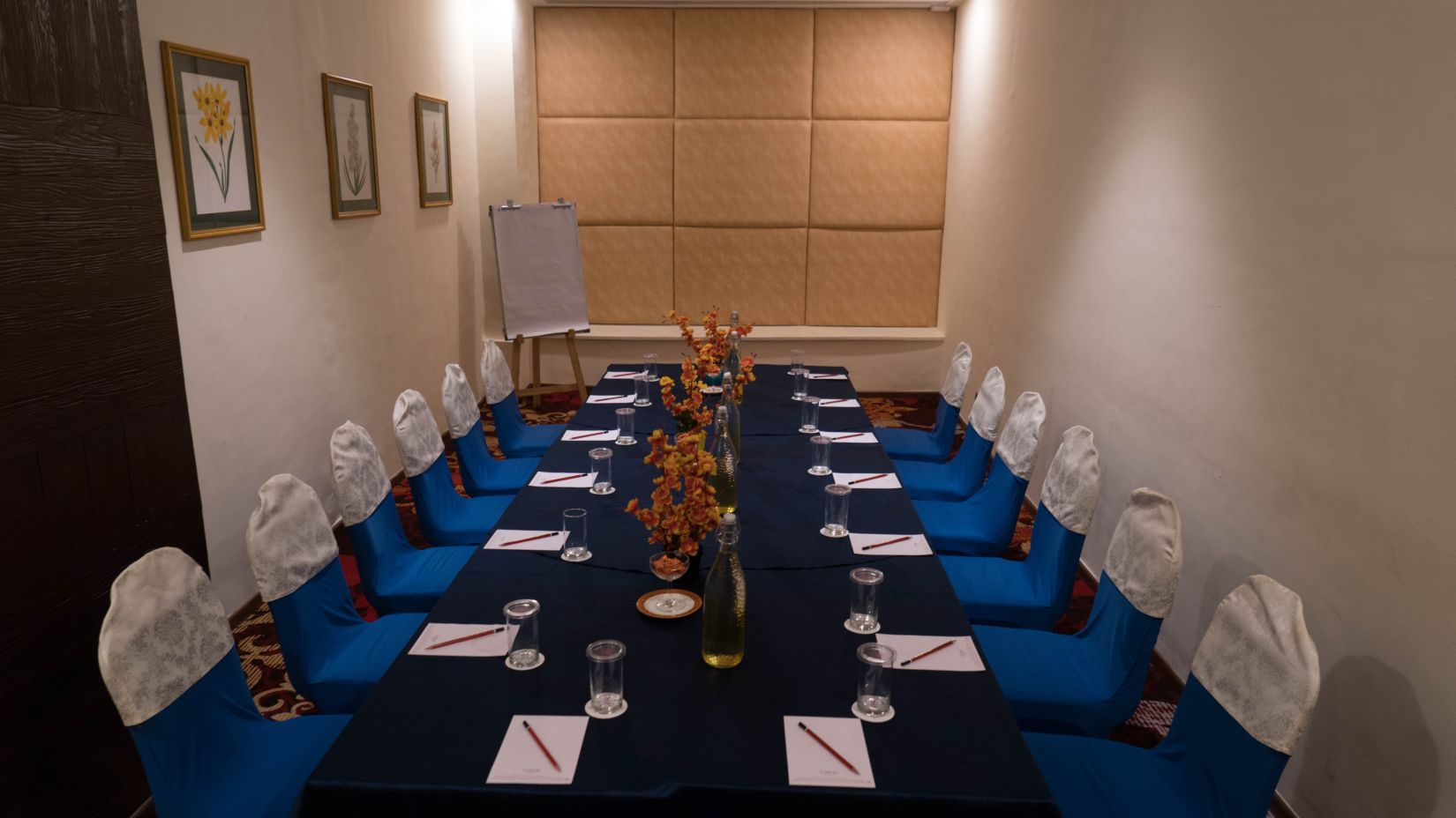 a conference room with lights on  - The Orchid Hotel Pune