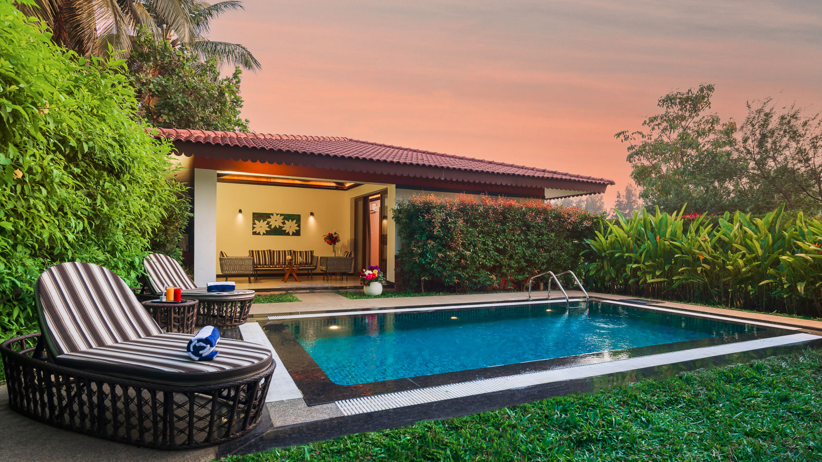 Gamyam Retreat, Kumta - Sunloungers kept near the private pool that comes with our Pool Villa room