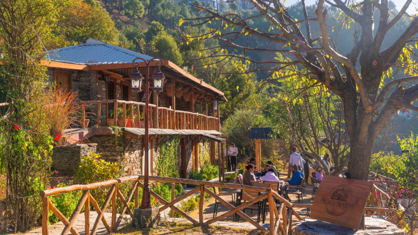 The Manor Shimla - People sitting at Boca Mario restaurant amidst the mountains