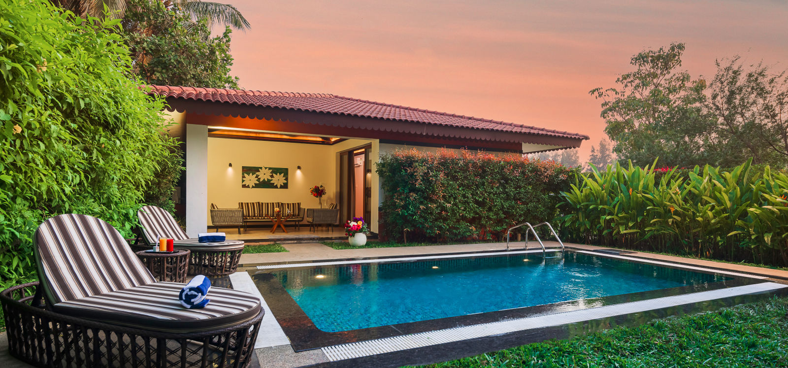 Gamyam Retreat, Kumta - Sunloungers kept near the private pool that comes with our Pool Villa room