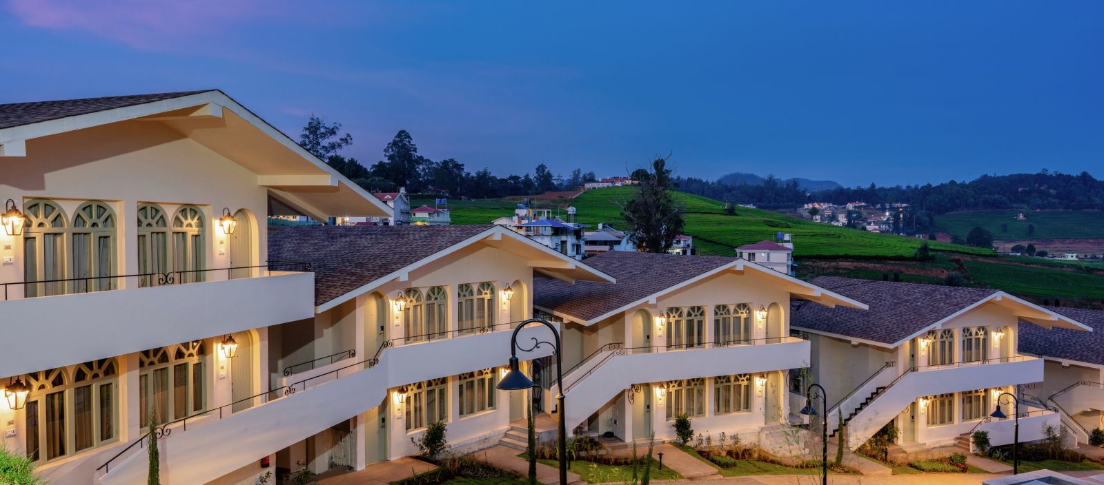 A facade of few buildings in a resort | Mango Hill Shola, Ooty