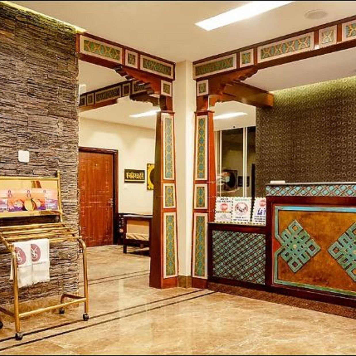 Overview of the Lobby area with newspaper rack in view - Sumitel Gangtok