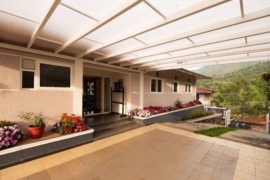 alt-text Main House Entrance from gate with fiber ceiling - Ibex Stays & Trails, Kotagiri