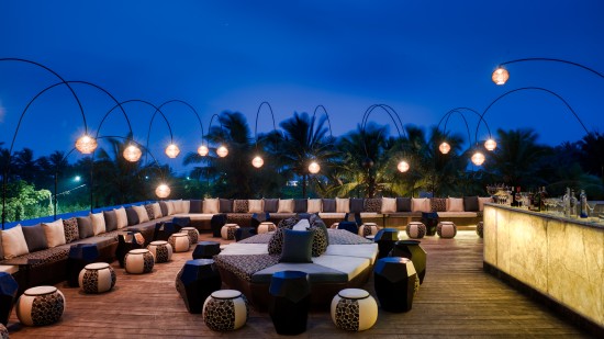 seating area at Lynx Patio with the late evening sky in the background, restaurant in south Goa - Azaya Beach Resort Goa