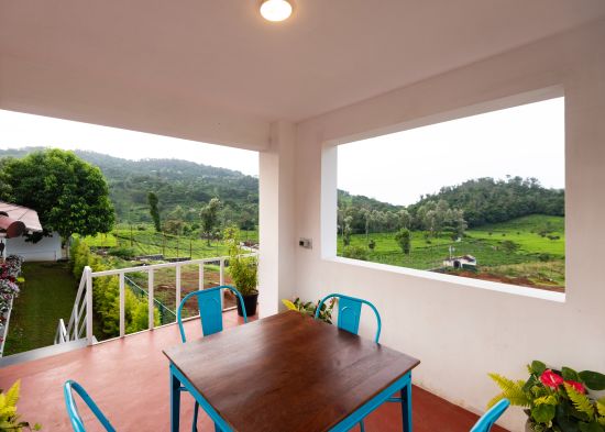 alt-text Private Dining Area View a table and chairs in it - Ibex Stays & Trails, Kotagiri