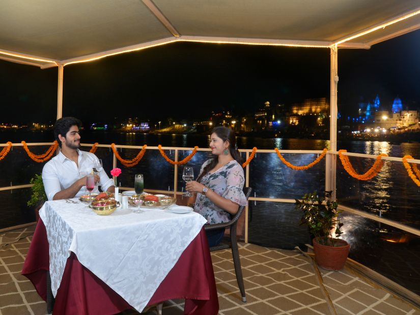 a couple dining on a boat