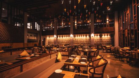 interior of the islander restaurant at symphony samudra beachside jungle resort and spa