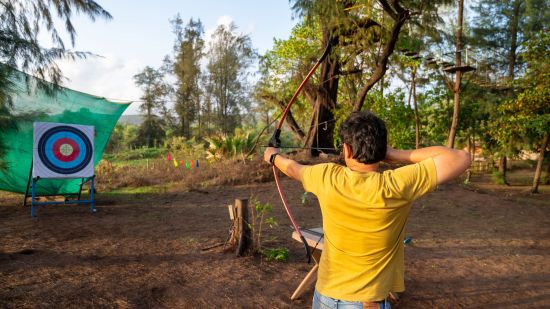 Lotus Eco beach resort, a person drawing a bow