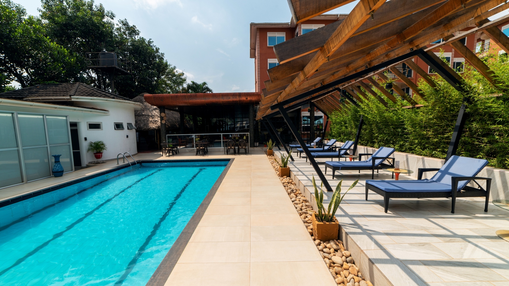 Large pool with poolside seats