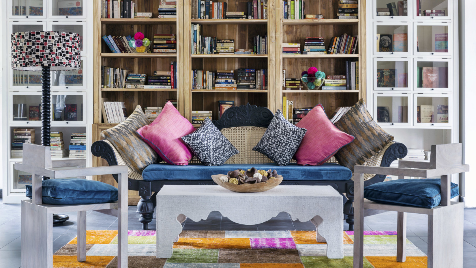 couch and bookshelf in Drawing Room