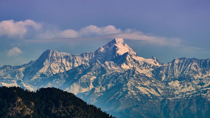 snow-capped mountains during day time