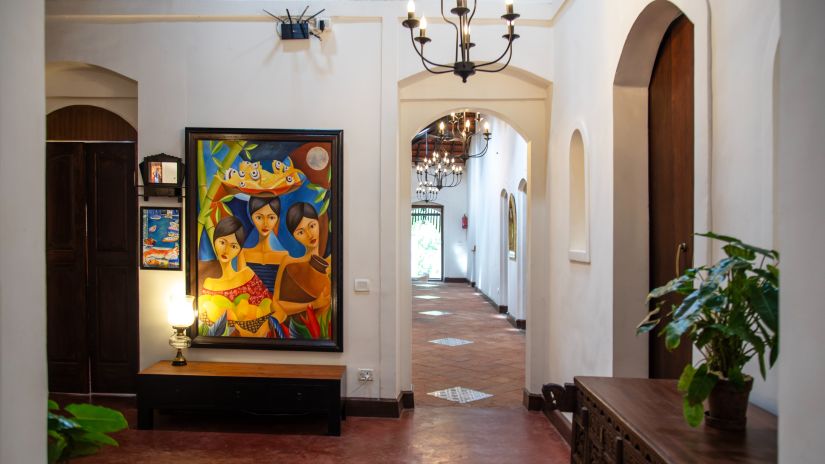 lobby view with beautiful big painting @ Lamrin Ucassaim Hotel, Goa
