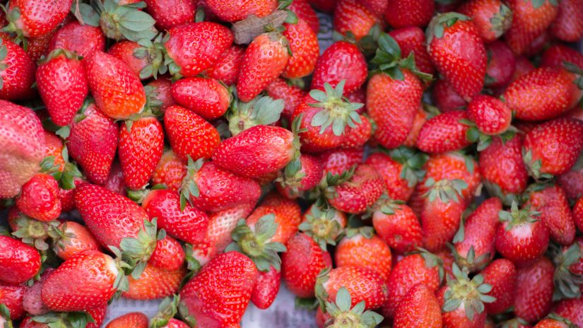 a pile of Strawberries