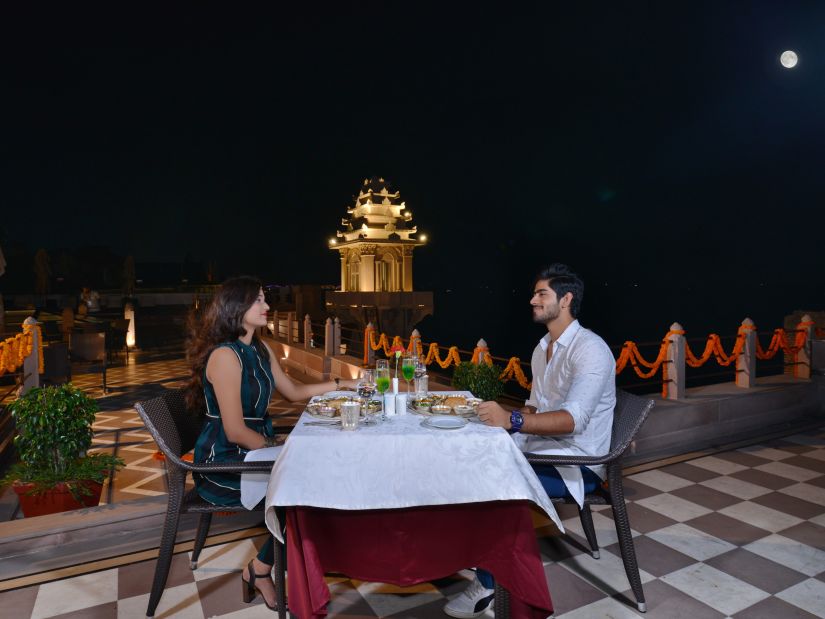 a couple dining together on the terrace