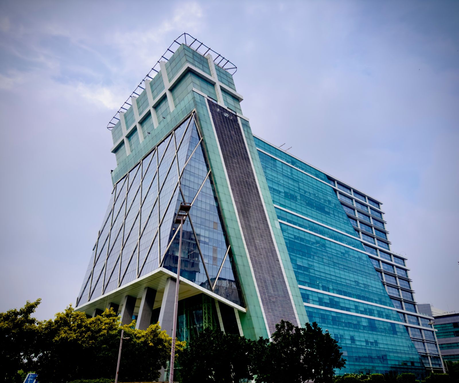 an overview of DLF cybercity with white clouds on blue sky in the background