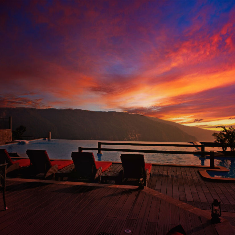 seating arrangement beside the infinity pool