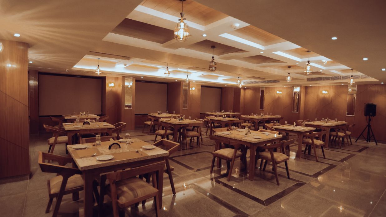 Clarks Inn Express Dehradun - interior view of the restaurant with numerous seating options