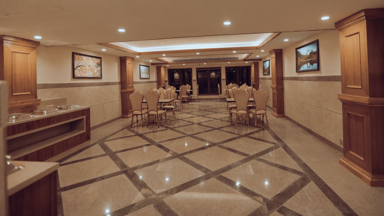 Clarks Inn Express Dehradun - interior view of the Pearl banquet hall featuring numerous seating options