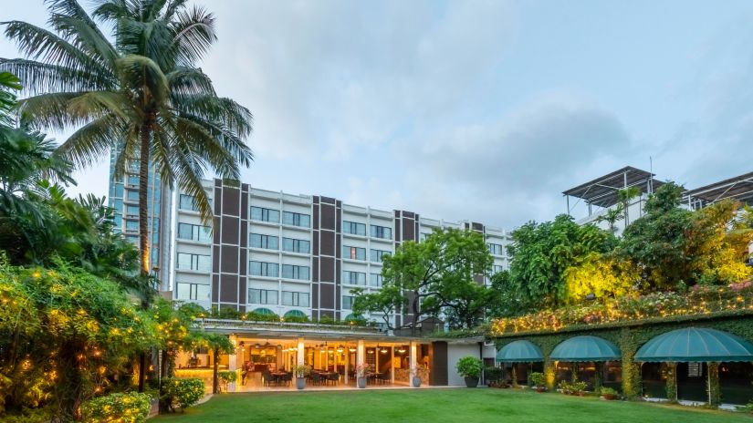 Facade of Kenilworth Hotel with a lawn in the foreground- 4-star Luxury Hotel in Kolkata