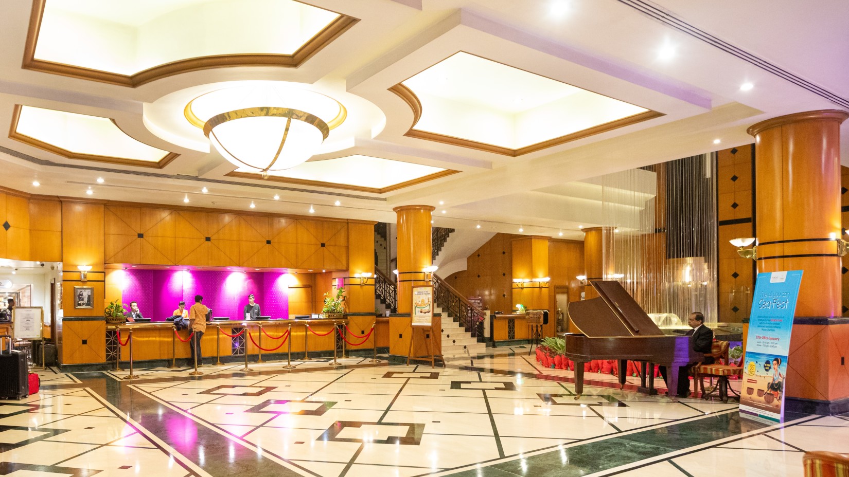 lobby of our 5-star hotel near mumbai airport with sophesticated interior and bright lights