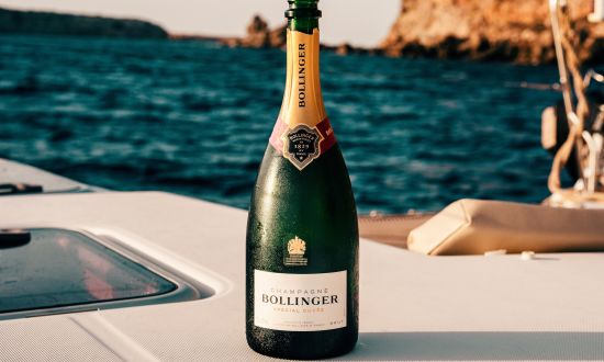 alt-text a Bollinger Brut Special champagne kept on the table - Symphony Samudra Beachside Jungle Resort And Spa