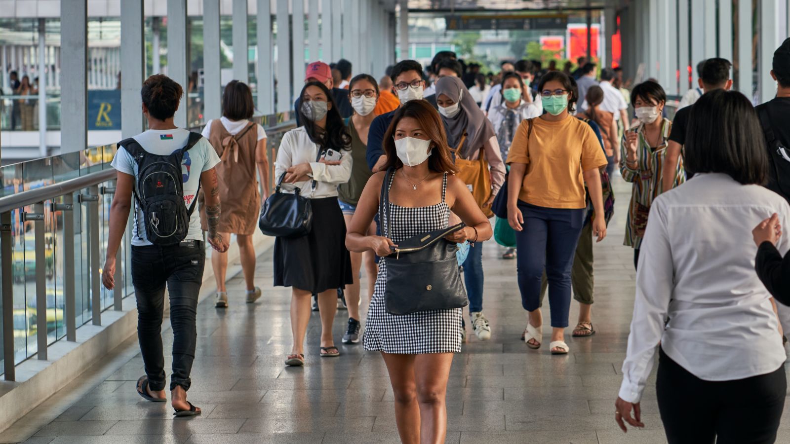 People walking at a train terminal during daytime