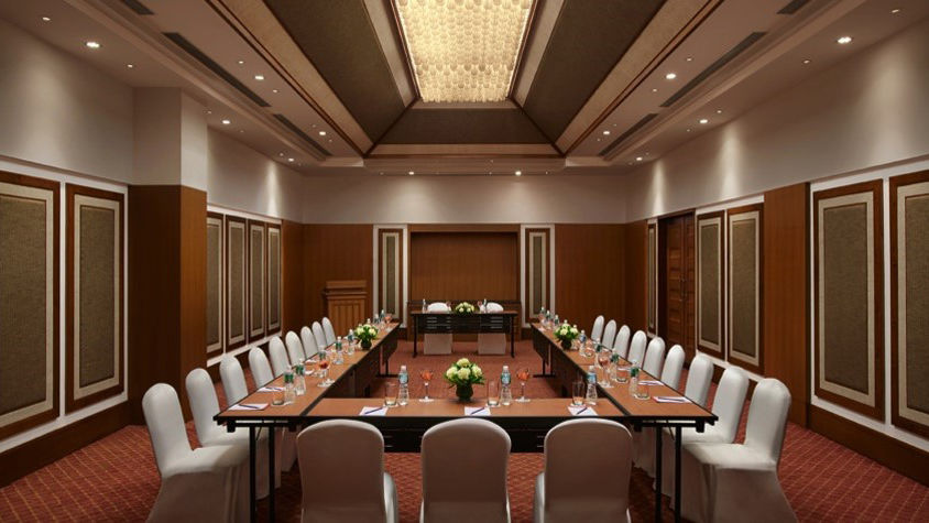 rectangle seating arrangements inside a meeting hall at Caravela Beach Resort