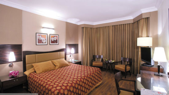 bedroom of the Executive Room at The Retreat Hotel and Convention Centre Malad Mumbai