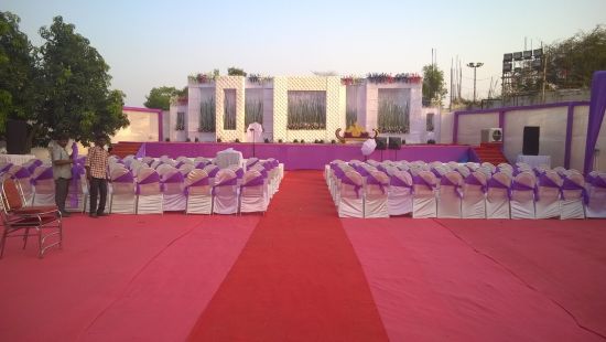 seating arrangements with pink and red carpet at the Poolside Event - VITS Kamats Resort, Silvassa