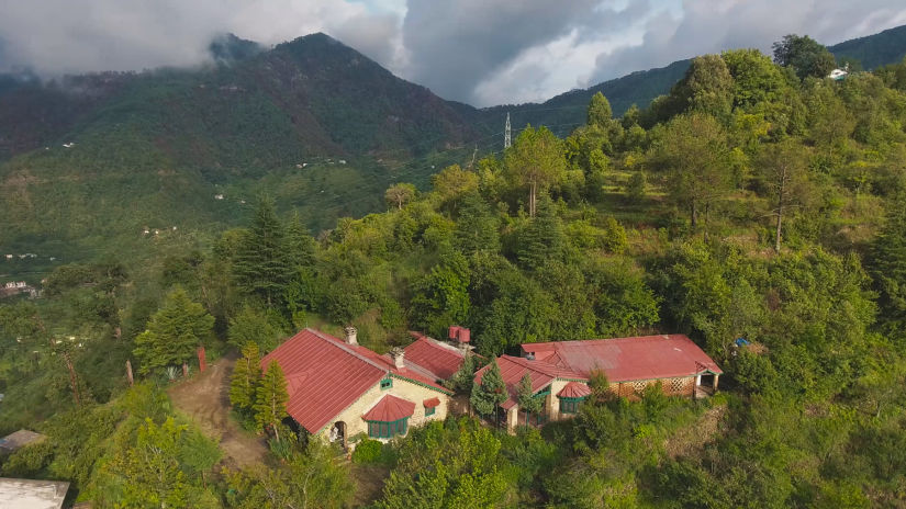 The Ramgarh Bungalows - bird eye view of the bungalows surrounded by majestic mountains