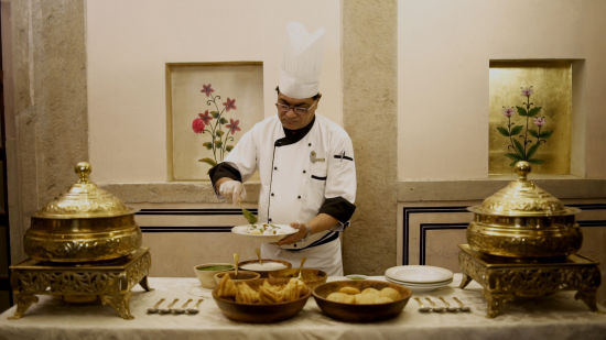 an image of man preparing food