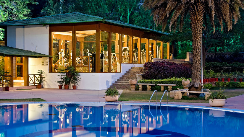 A panorama of the well-maintained swimming pool and the gym at our hotel near Jaipur Airport