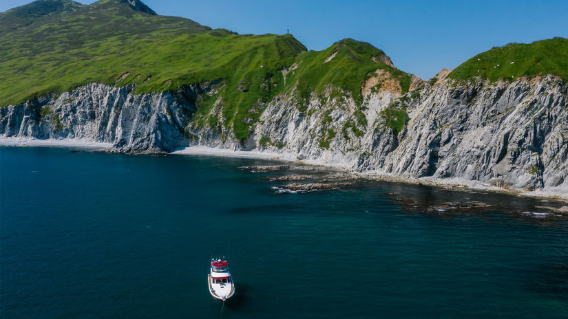 ship roaming around in magnificent blue sea