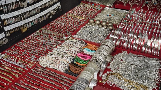 Assorted junk jewellery kept on a table for sale